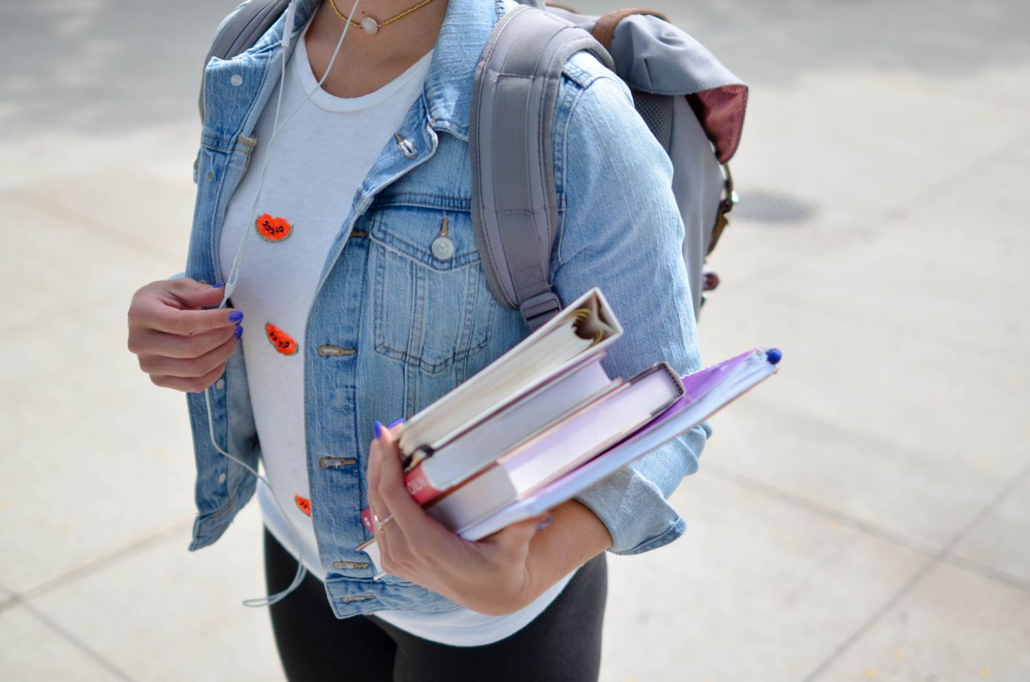 Female student carrying books